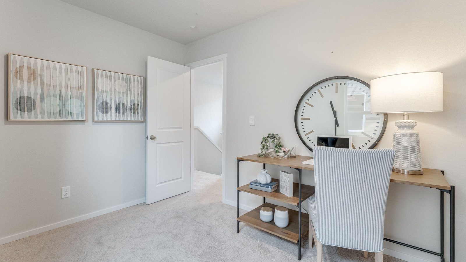 Bedroom with wall-to-wall carpet and a closet