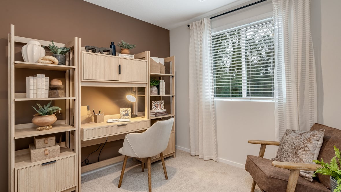 Bedroom with wall-to-wall carpet and a closet