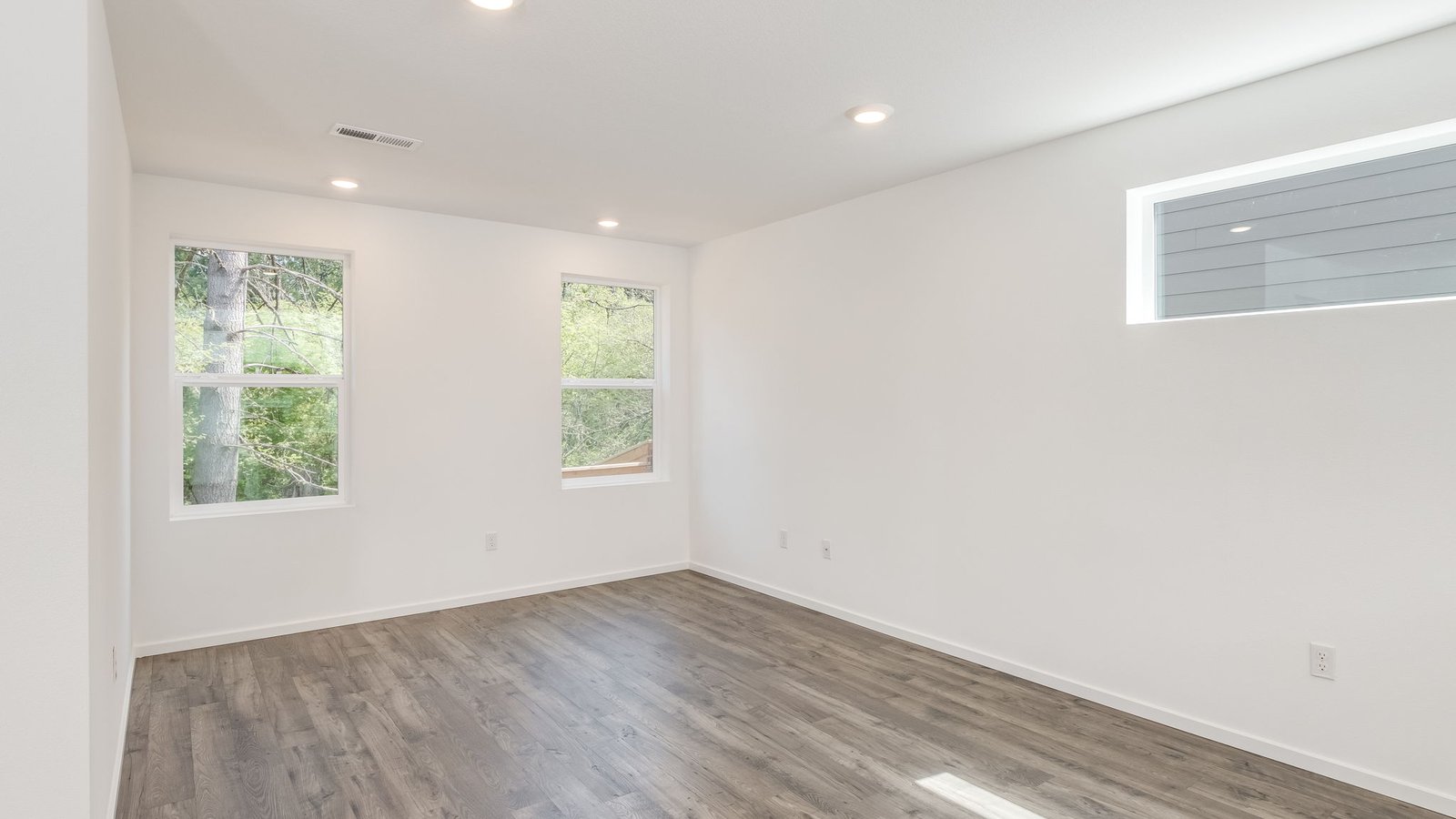 Great room with laminate flooring