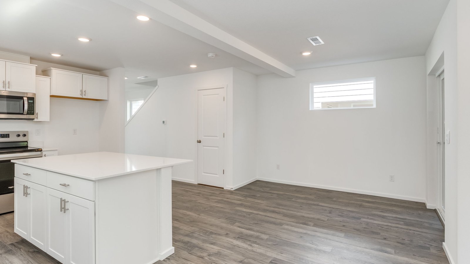 Great room with laminate flooring