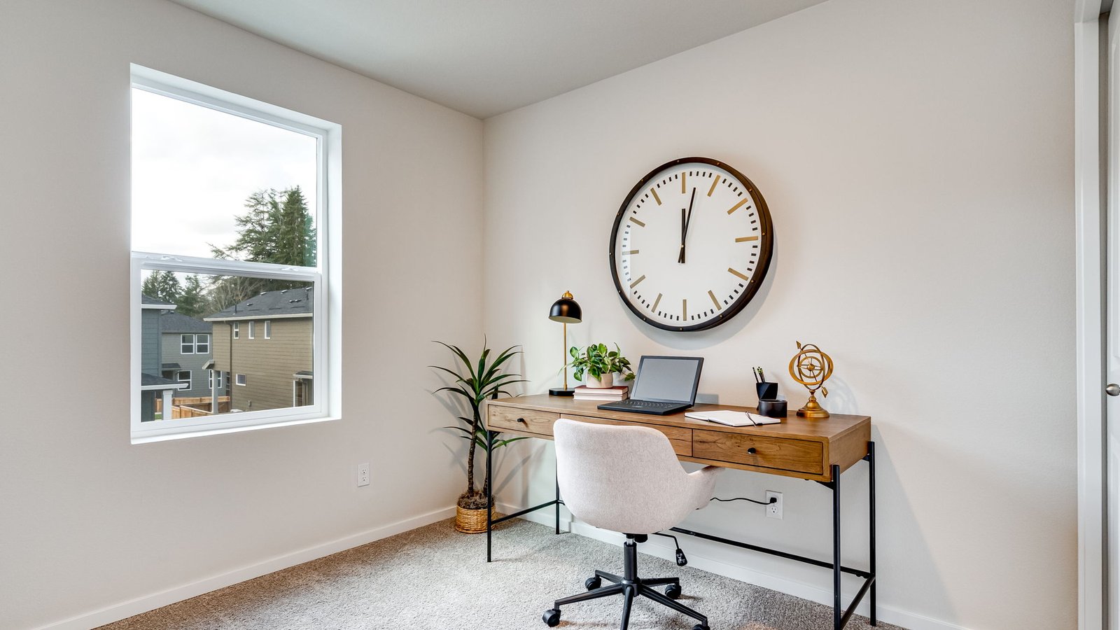 Bedroom with wall-to-wall carpet and a closet