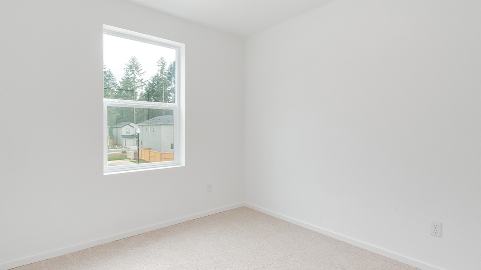 Bedroom with wall-to-wall carpet and a closet