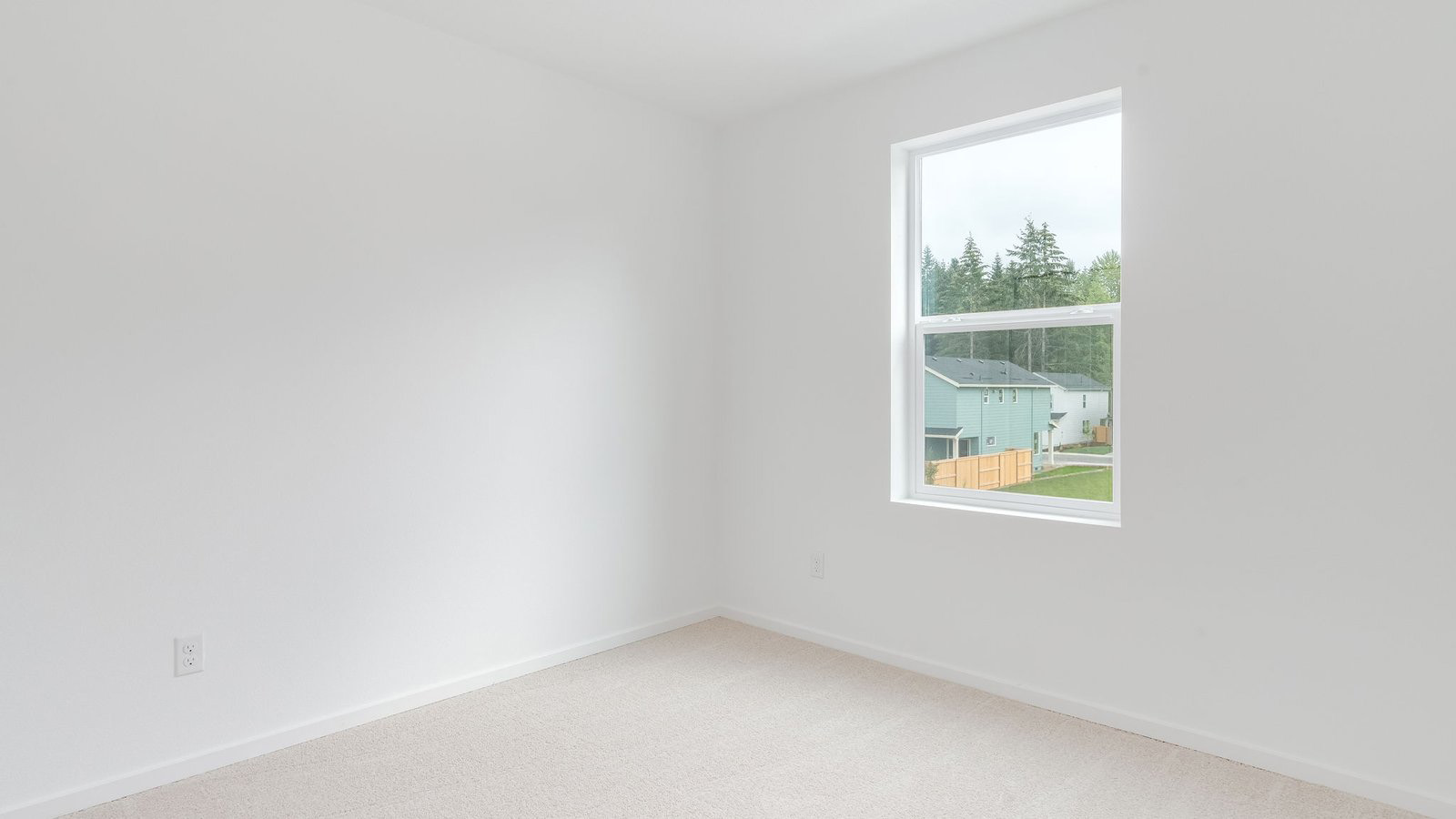 Bedroom with wall-to-wall carpet and a closet