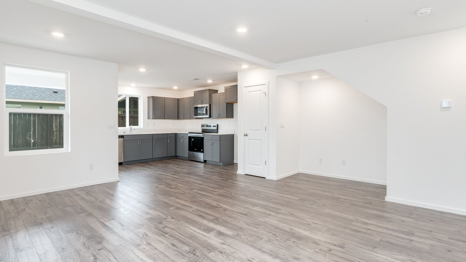 Great room with laminate flooring
