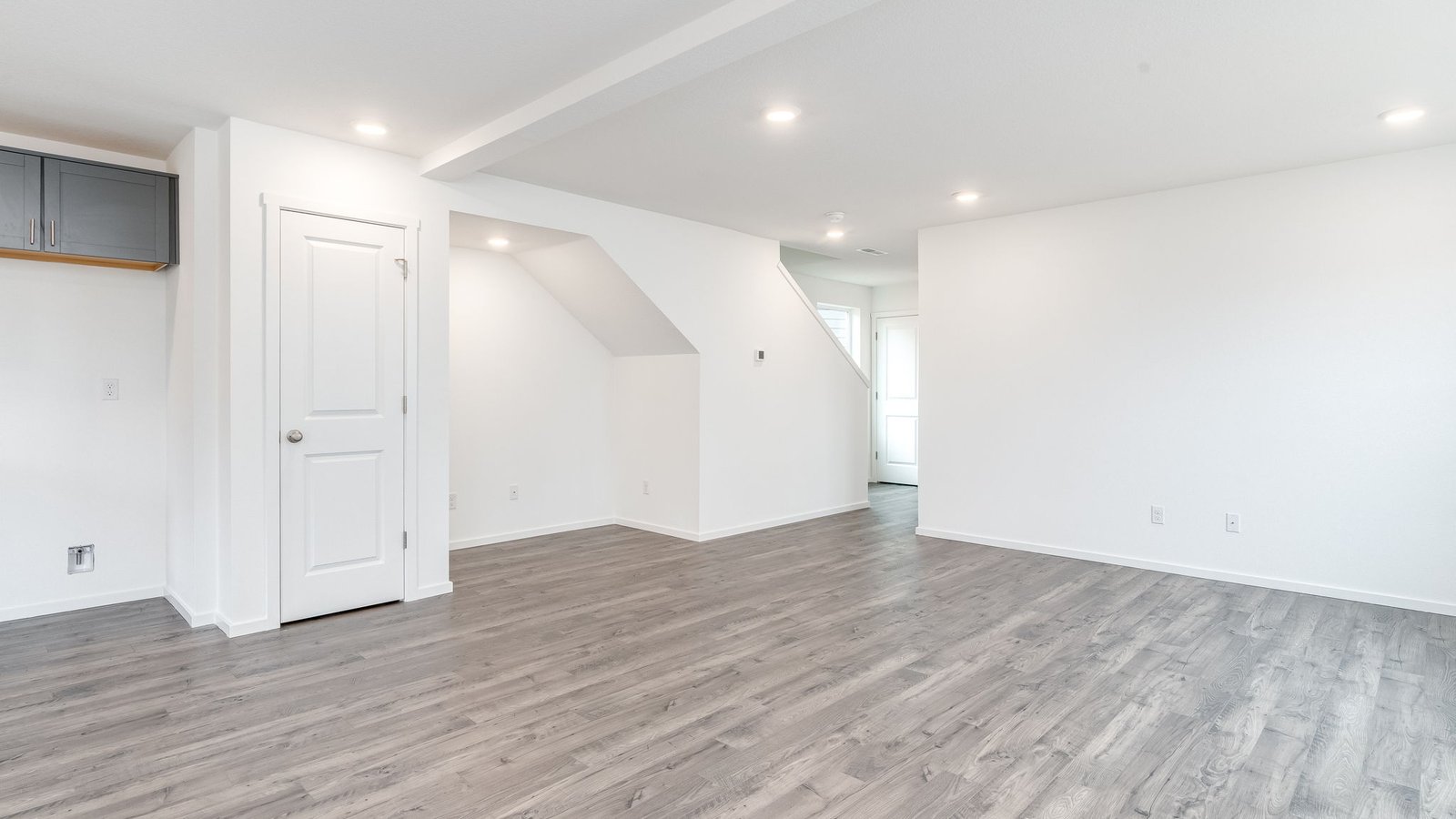 Great room with laminate flooring
