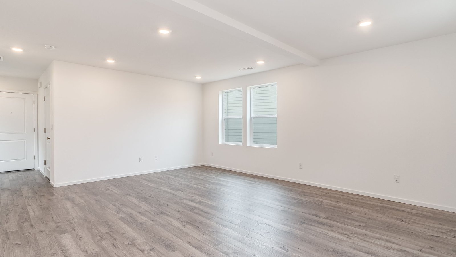 Great room with laminate flooring