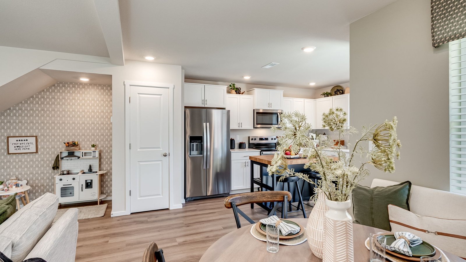 Great room with laminate flooring