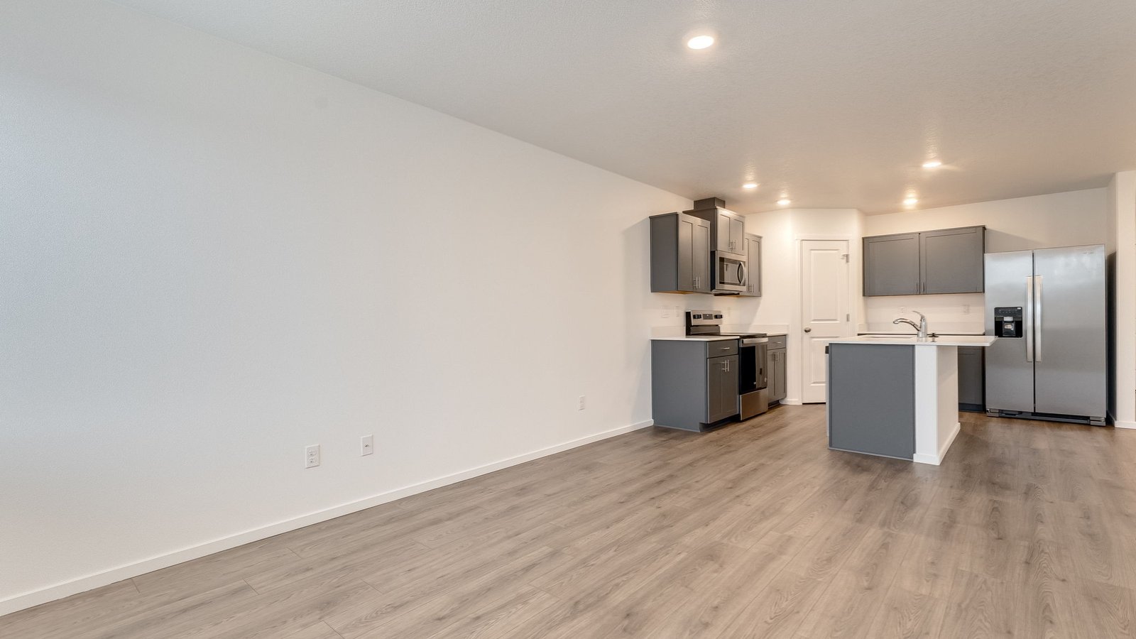Great room with laminate flooring