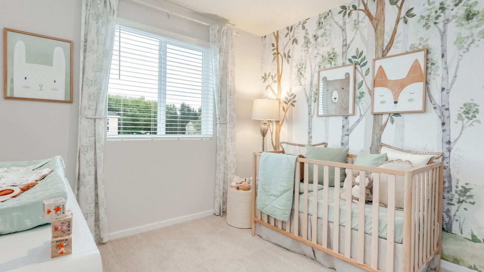 Bedroom with wall-to-wall carpet and a closet