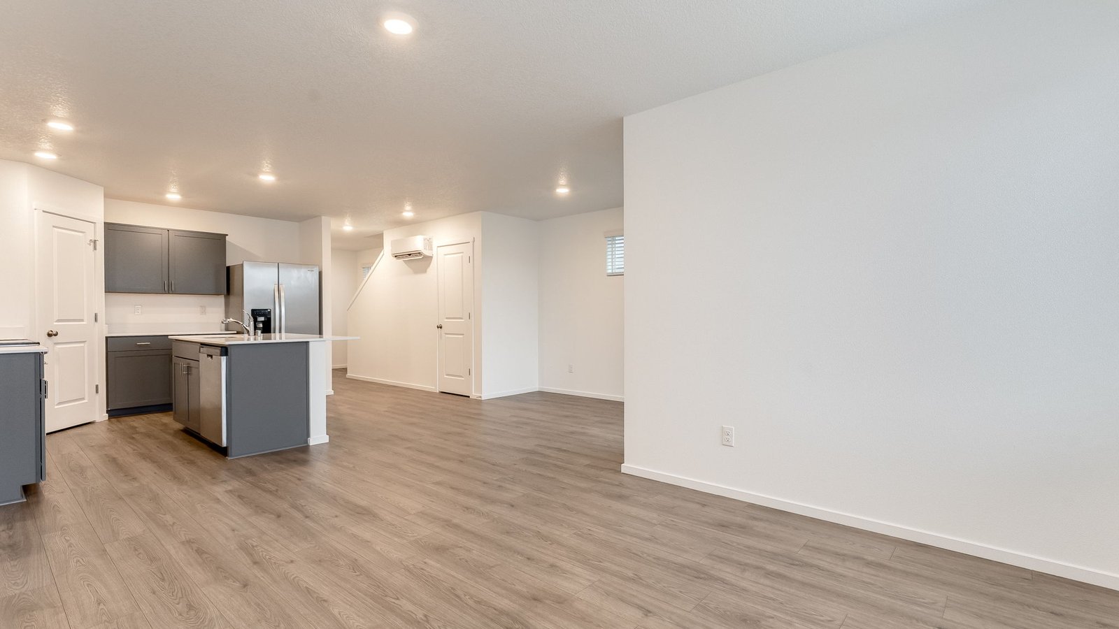 Great room with laminate flooring