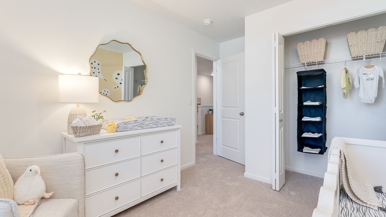 Bedroom with wall-to-wall carpet and a closet