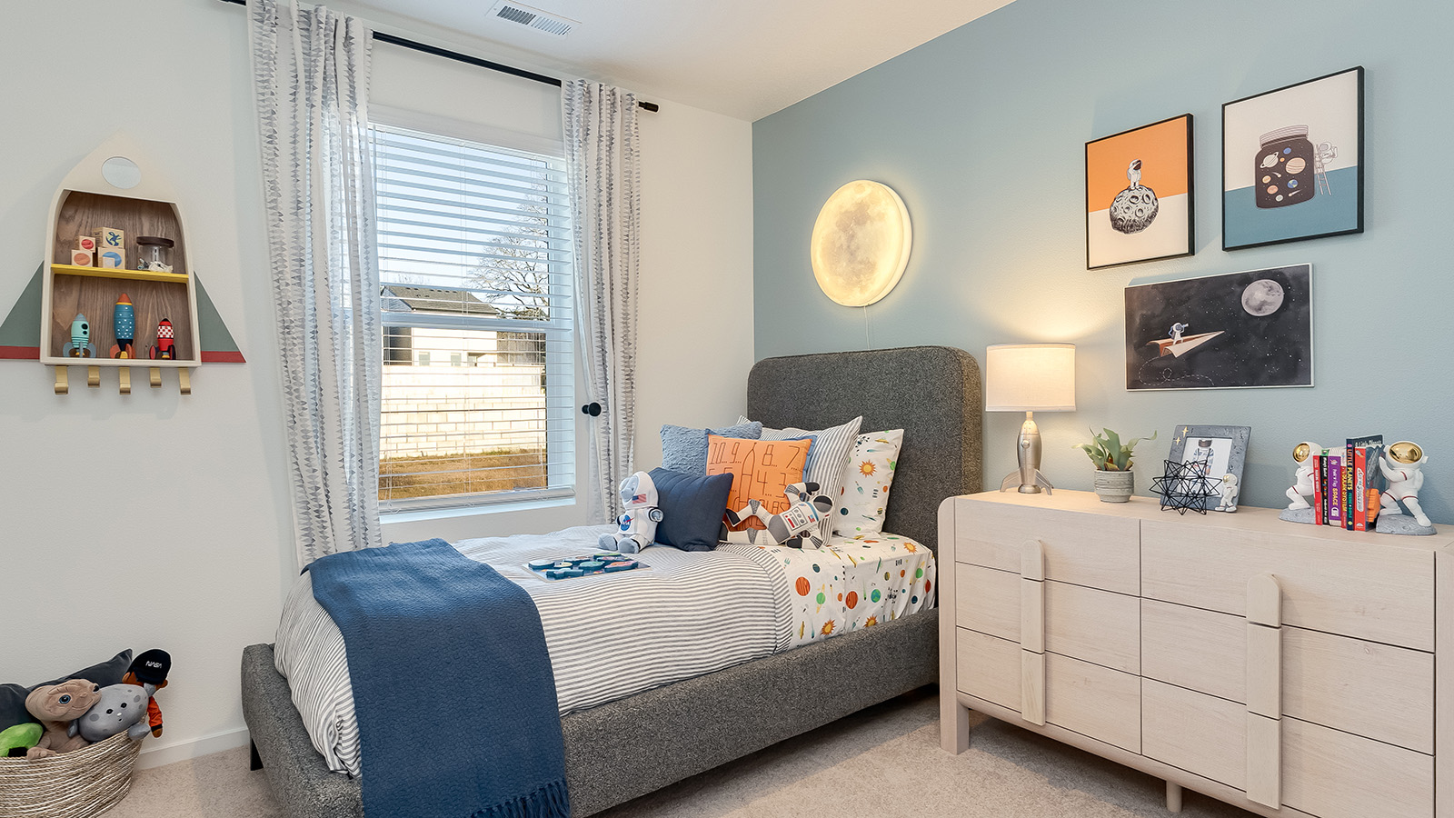 Bedroom with wall-to-wall carpet and a closet