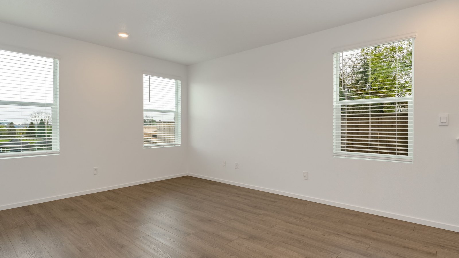 Great room with laminate flooring
