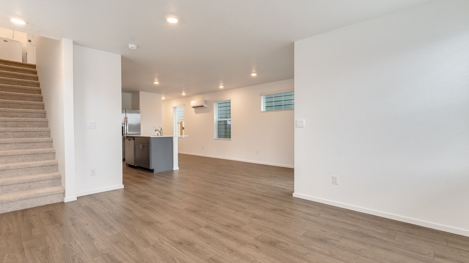 Great room with laminate flooring Great room with laminate flooring