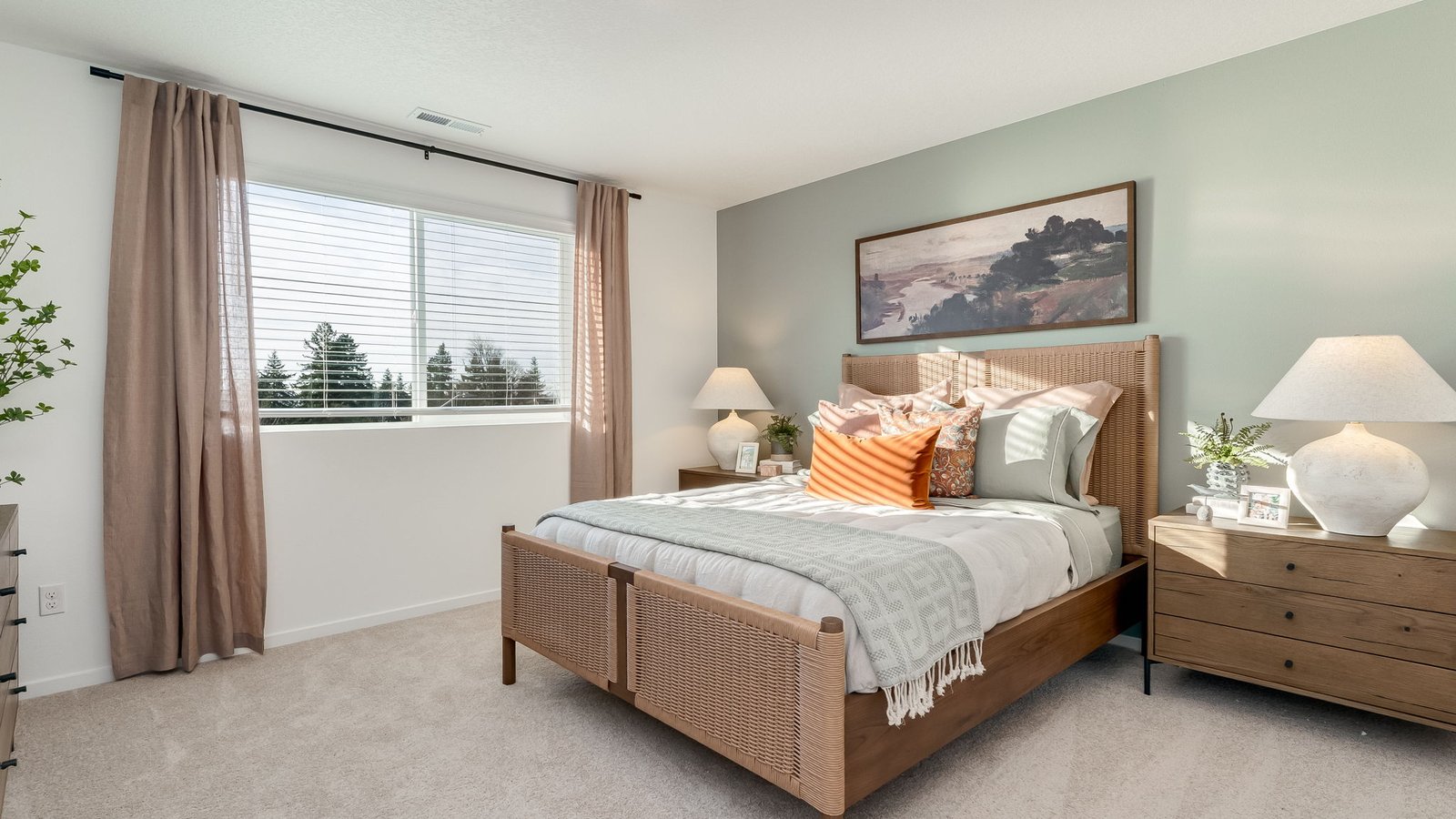 Primary bedroom with wall-to-wall carpet, a walk-in closet and an attached bathroom
