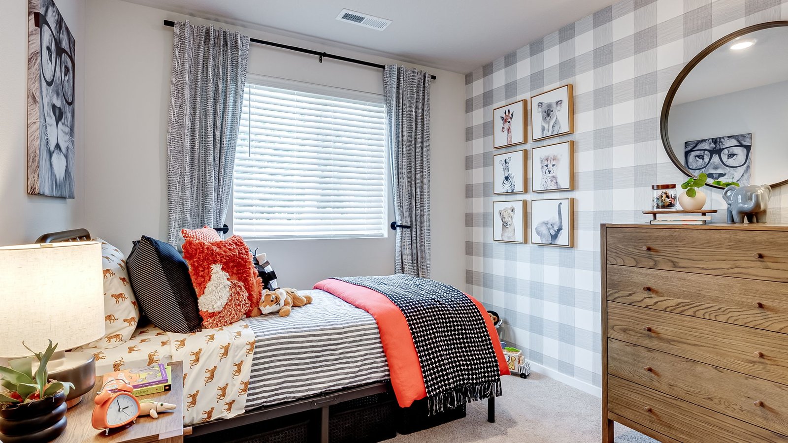 Bedroom with wall-to-wall carpet and a closet