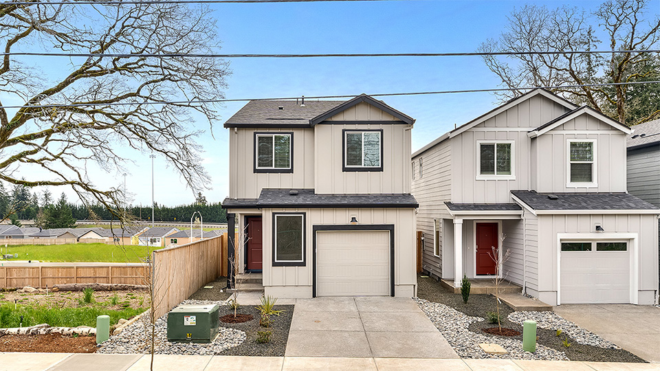 exterior front single-family home with an attached garage