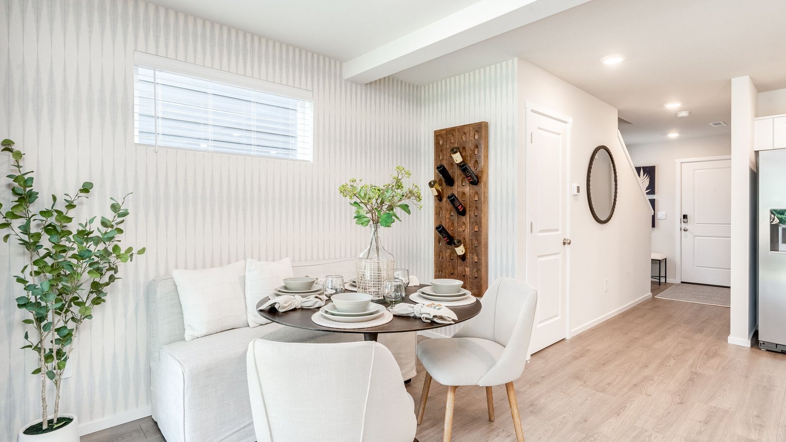 Dining area with a sliding glass door to a fenced backyard
