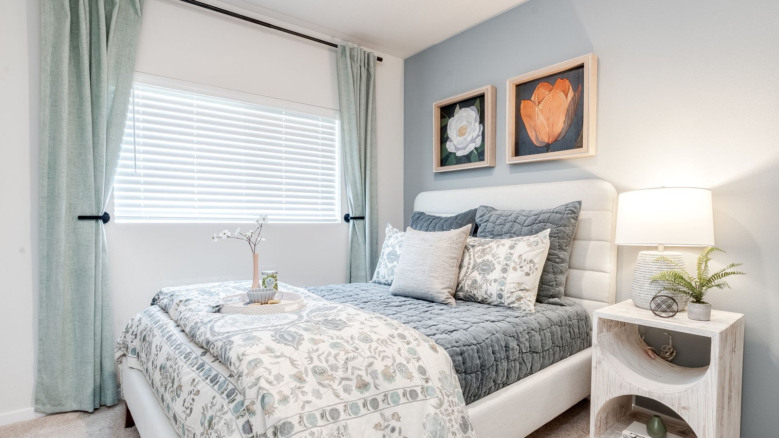 Bedroom with wall-to-wall carpet and a closet