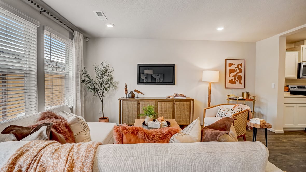 Great room with laminate flooring and an electric fireplace