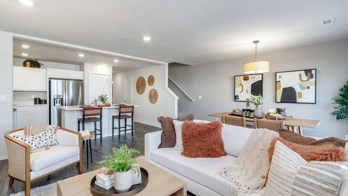 Great room with laminate flooring and an electric fireplace