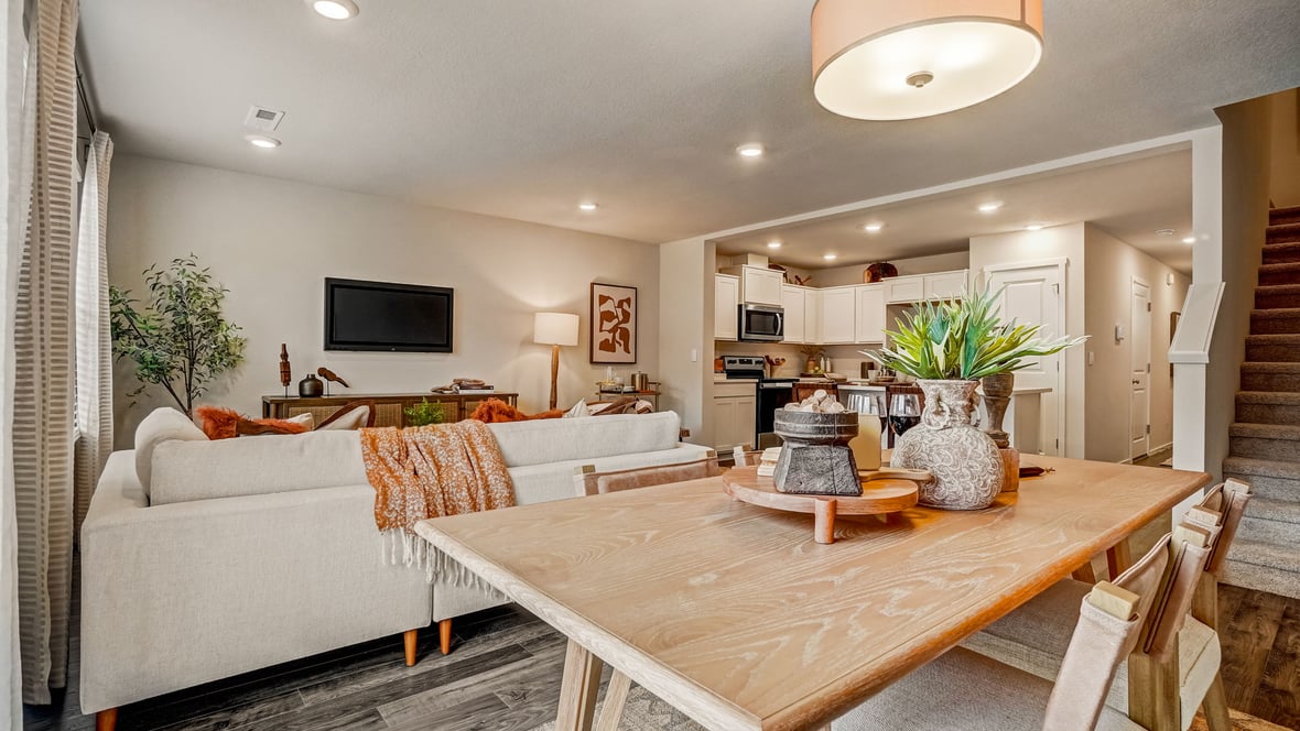 Great room with laminate flooring and an electric fireplace