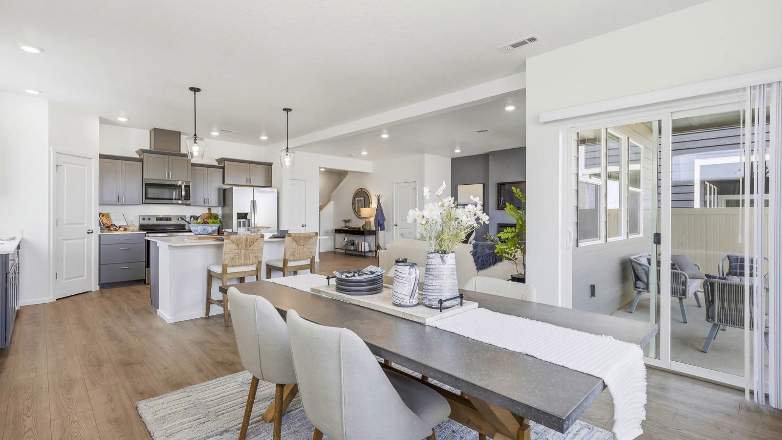 Great room with laminate flooring and an electric fireplace