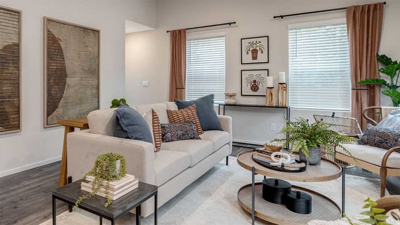 Great room with laminate flooring and an electric fireplace