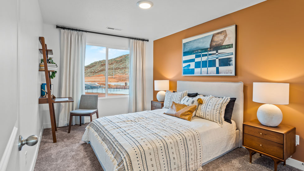 Spacious bedroom with large bright window