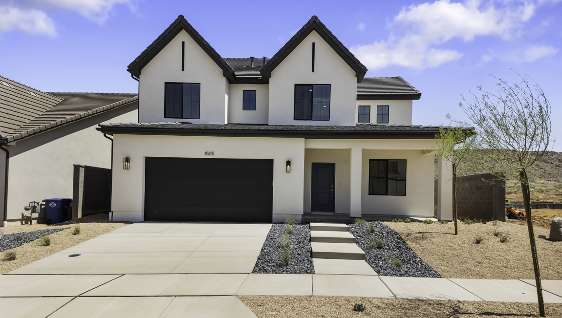 brand new desert style exterior home in Washington with two car garage