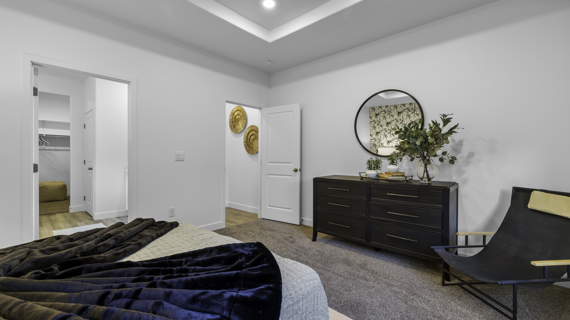 Spacious bedroom with large bright window