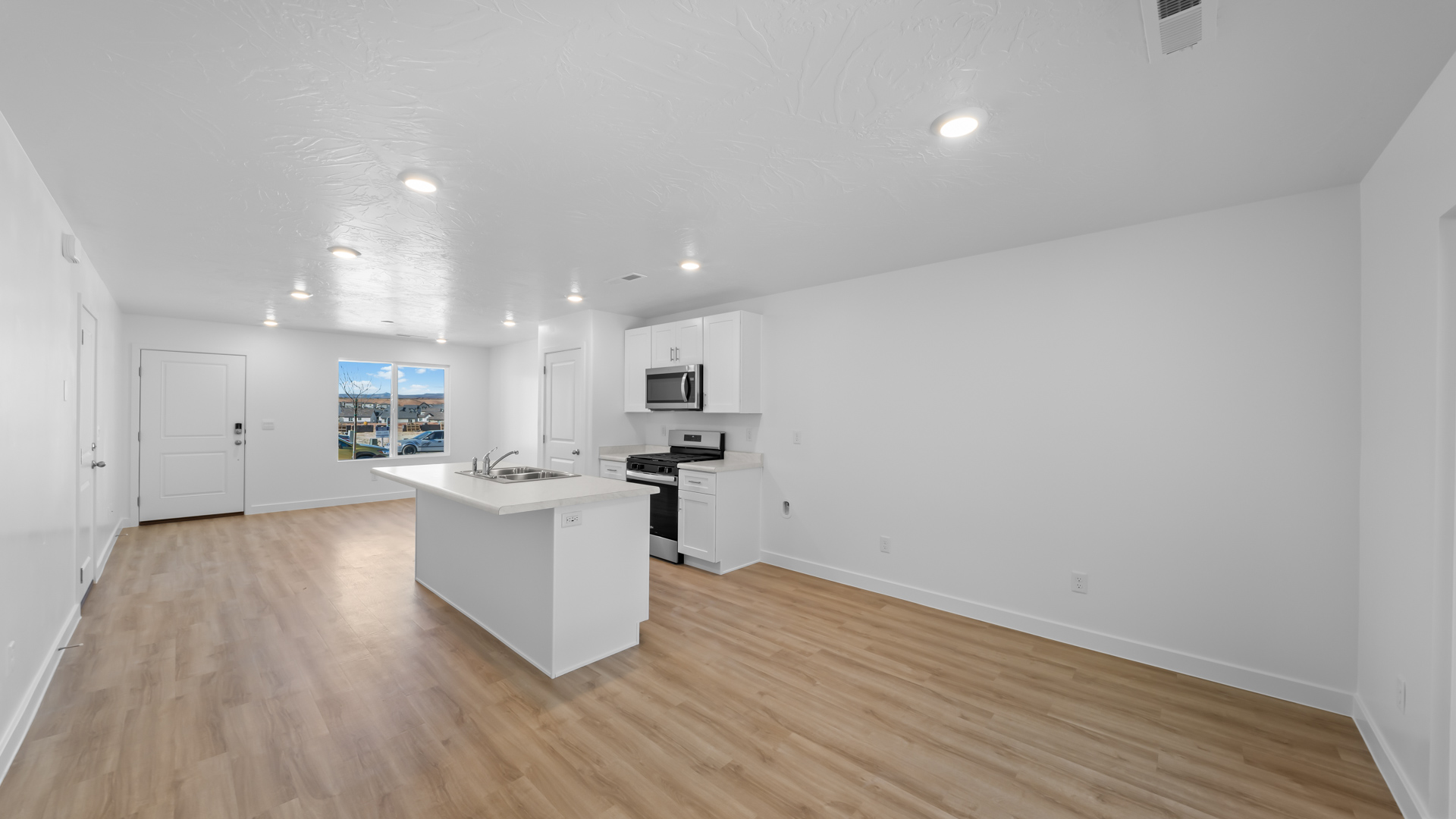 Dining and kitchen and main living space.