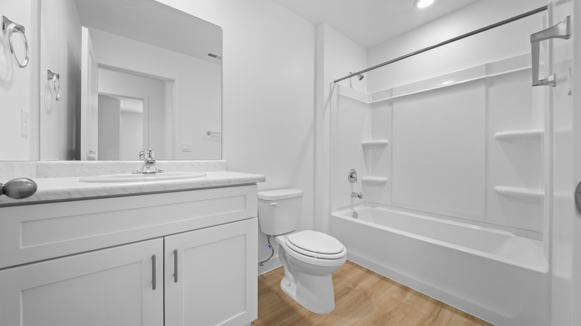 Bathroom with shower surround.