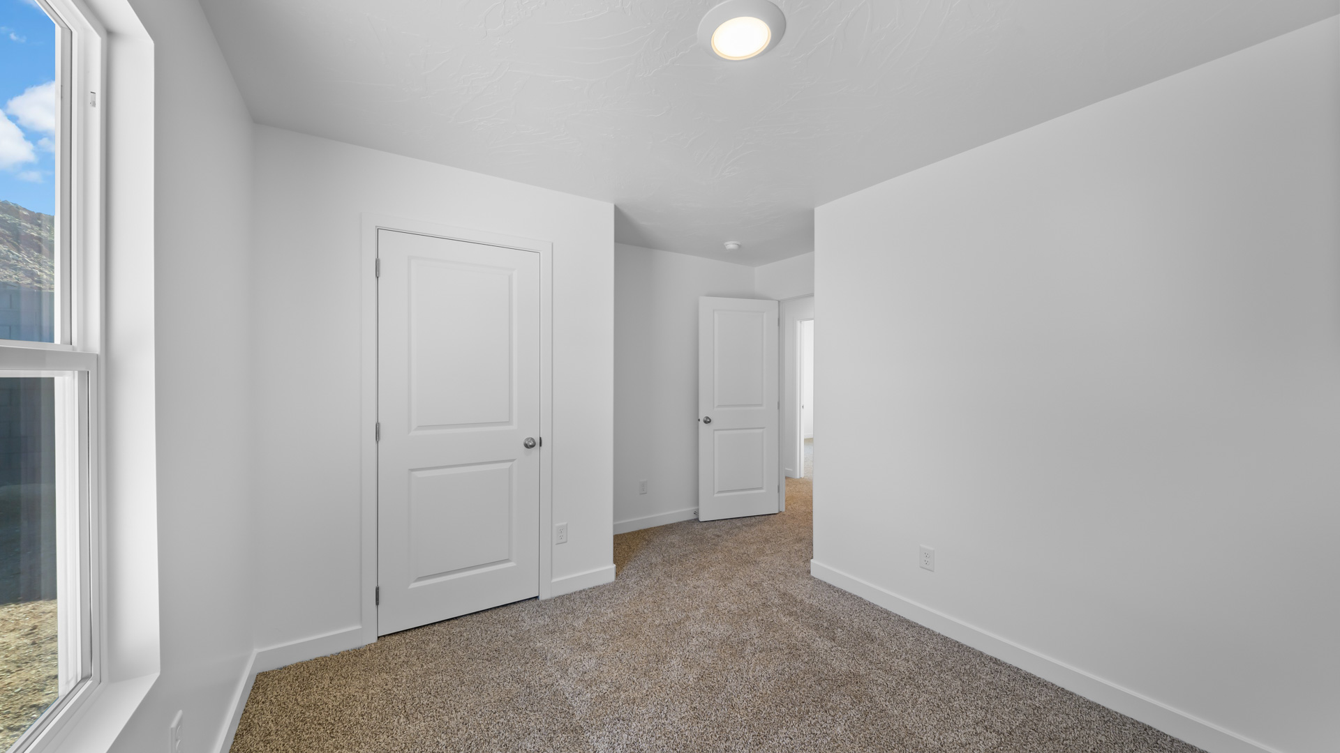 Bedroom with window.
