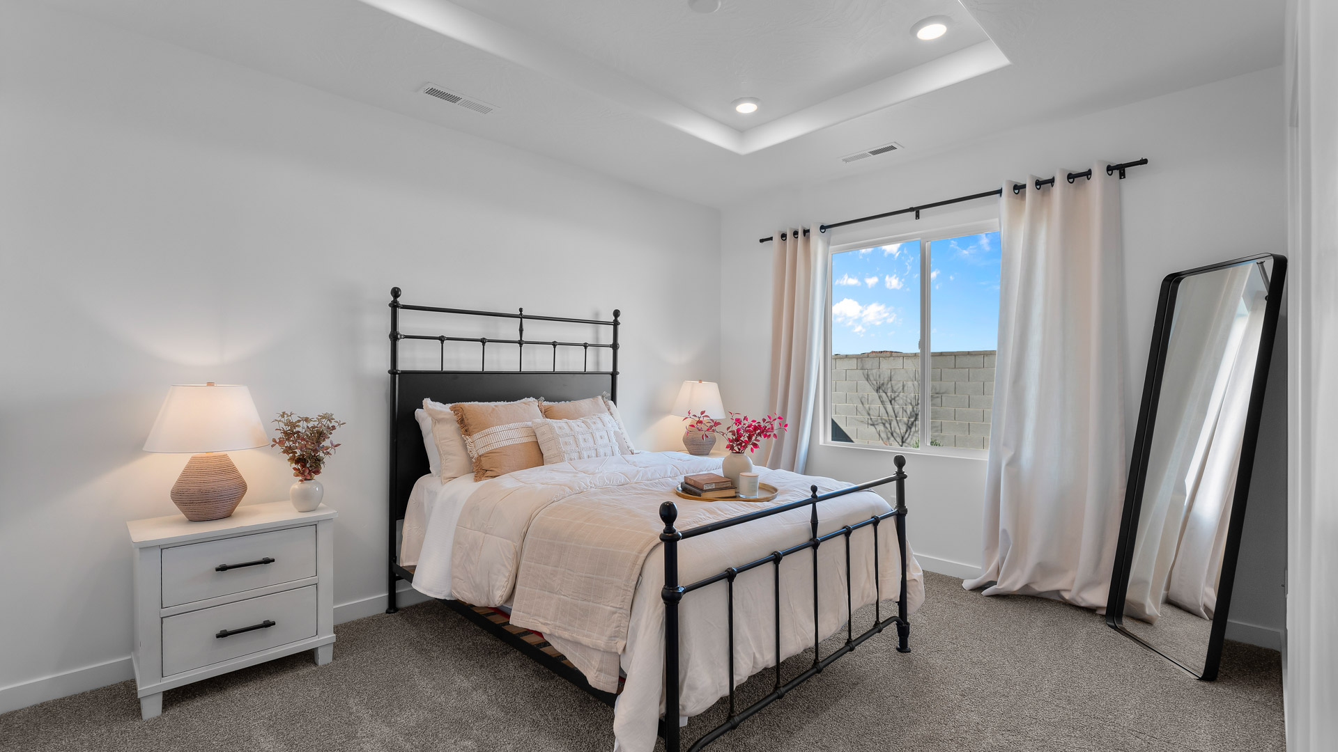 Spacious bedroom with large window