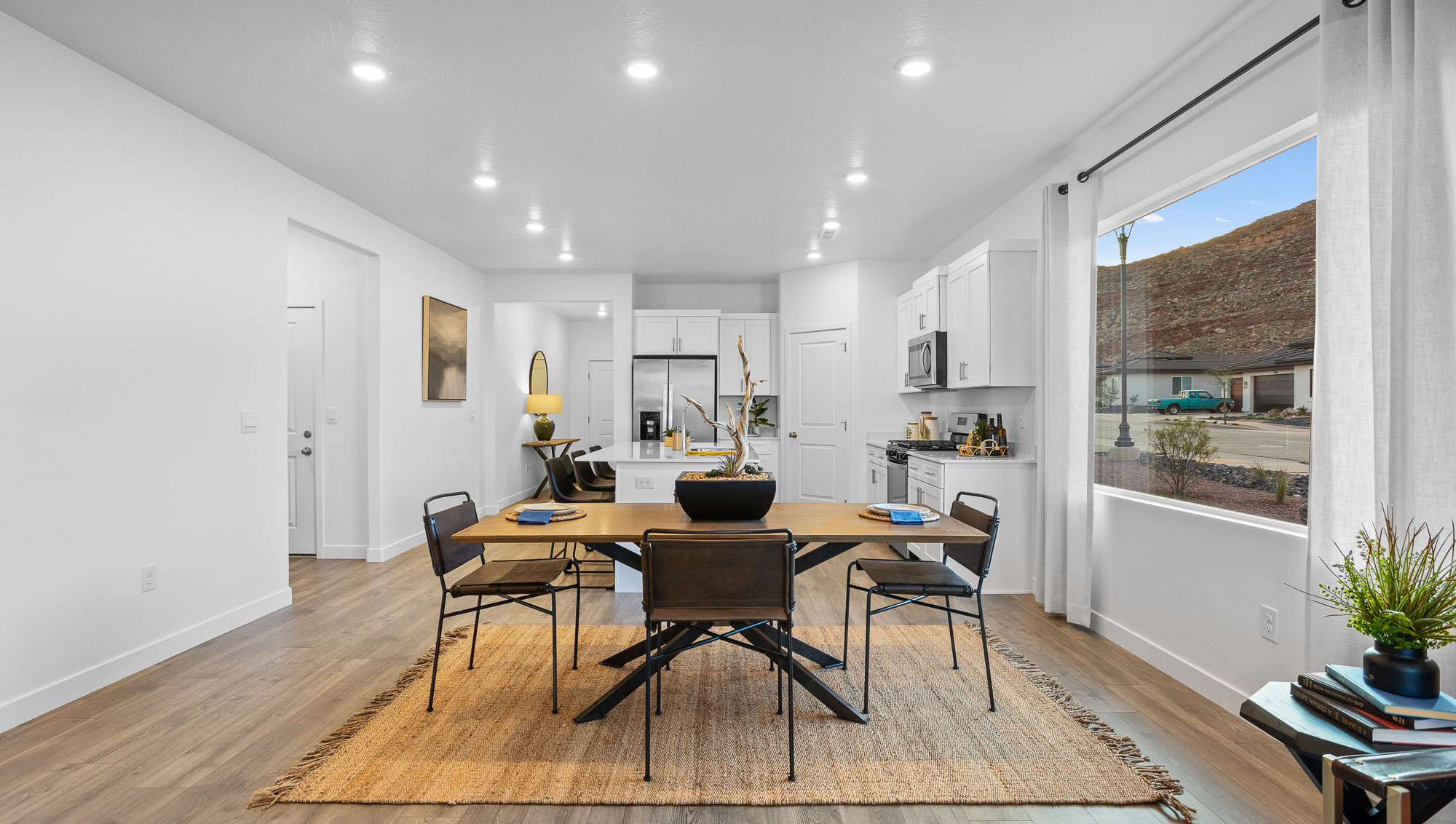 dining room with large picture window and premium laminate flooring