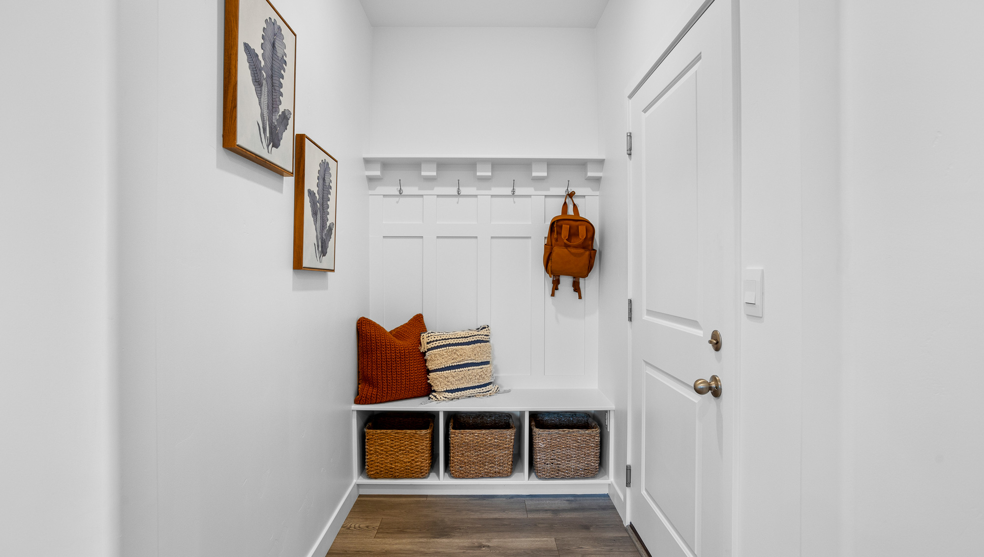 Mud room with built in cubbies and bench