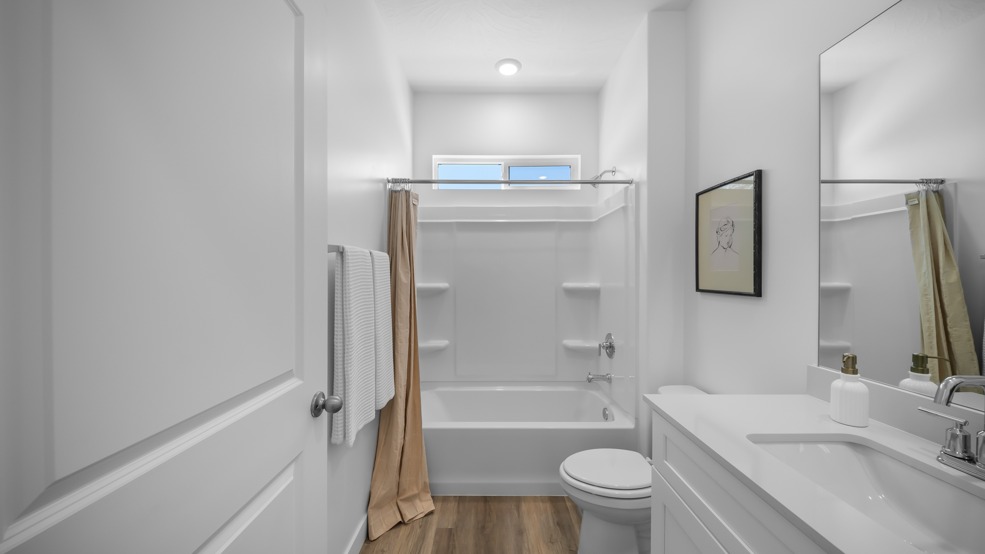 Bathroom with shower surround.