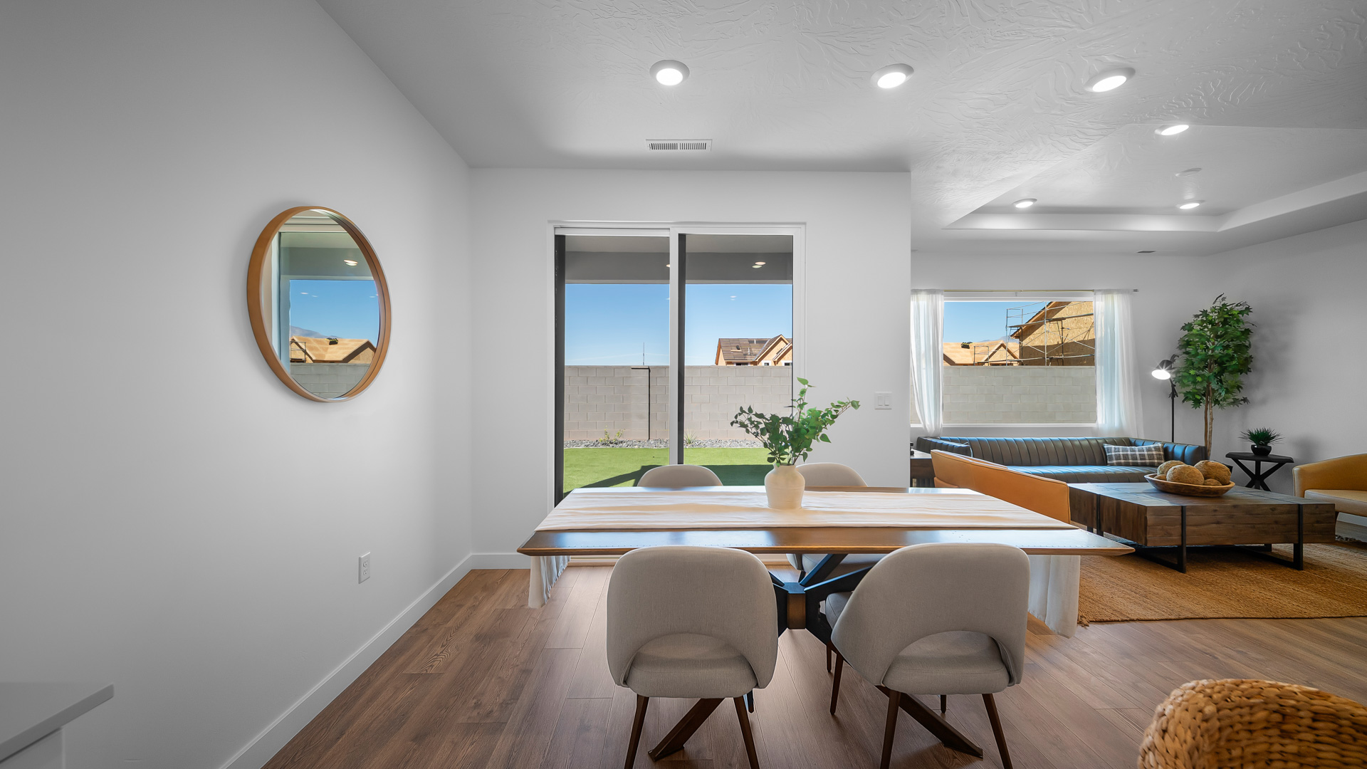 Dining area off kitchen with glass patio doors.