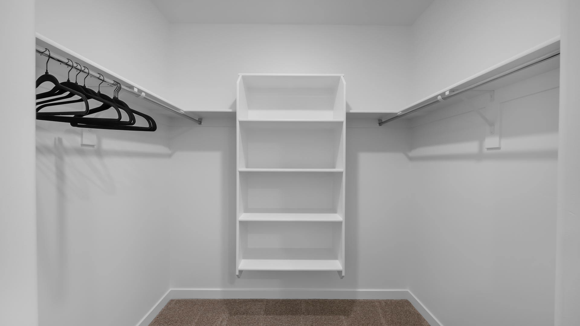 Primary spacious walk-in closet.