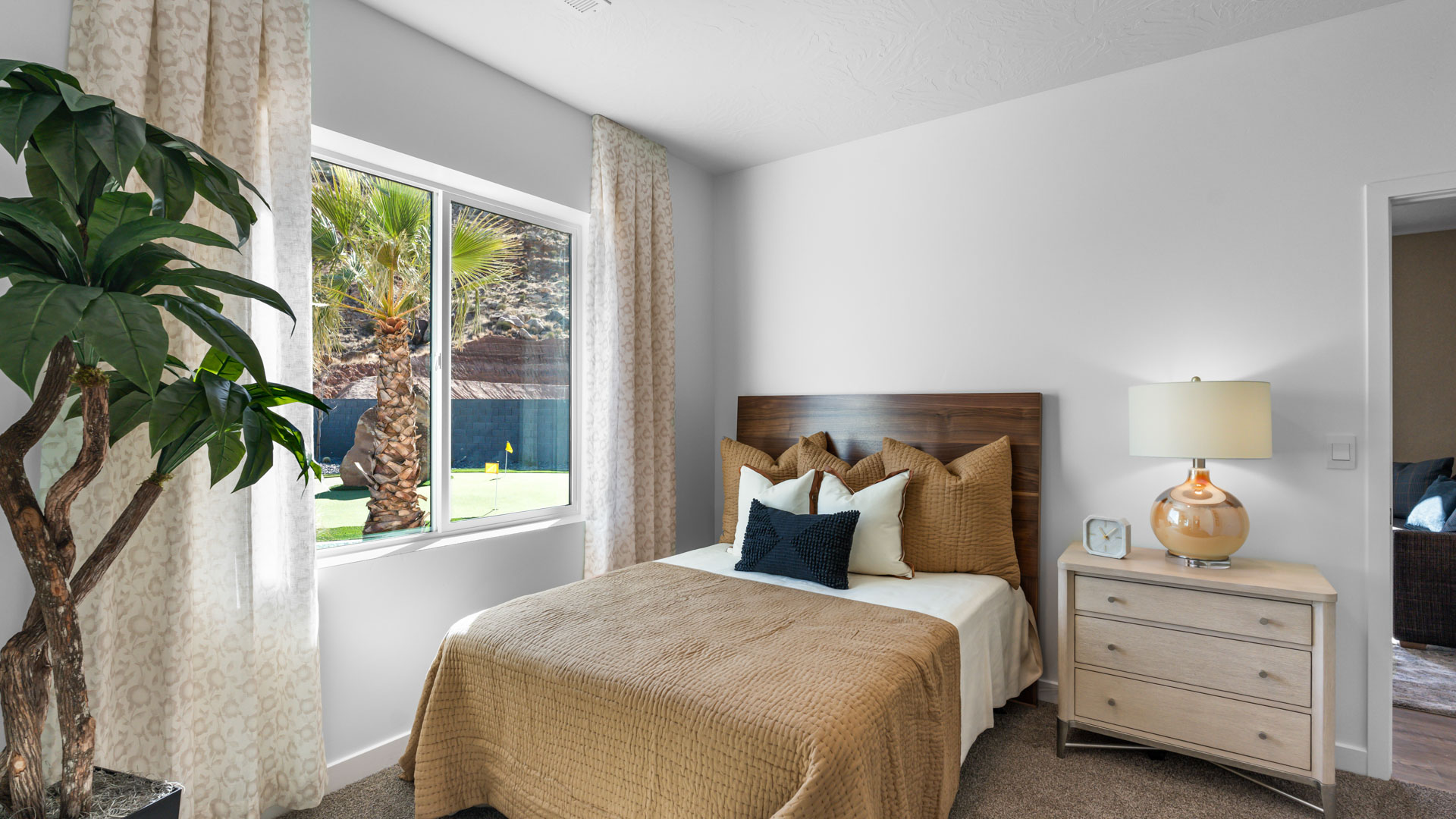 Casita bedroom with large window.
