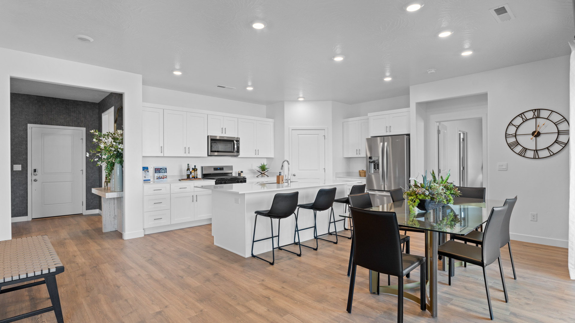 Dining space in kitchen with large patio doors.