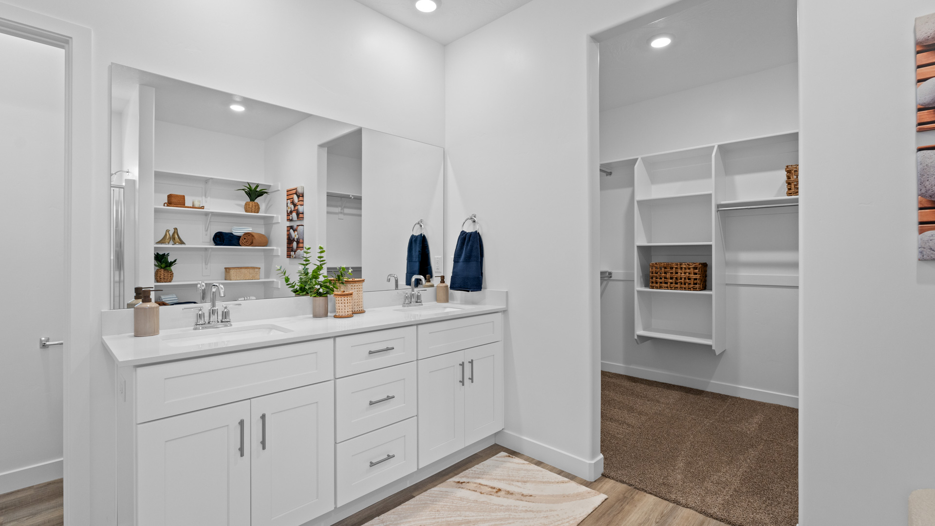 Spacious main bathroom with double sink vanity.
