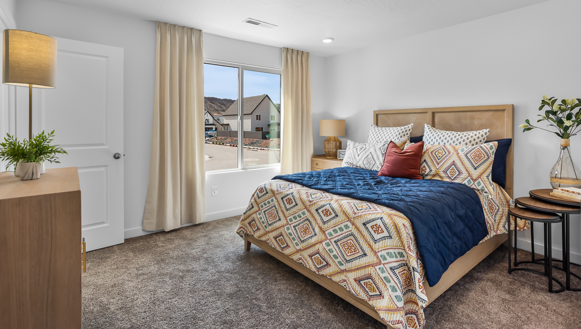 Primary bedroom with oversized window