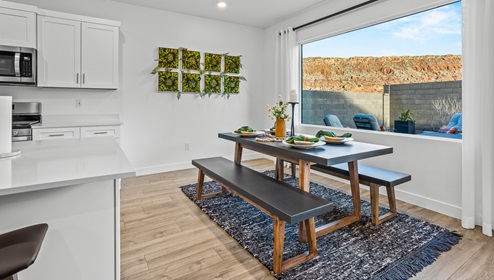 A closer focus on the dining area adjacent the kitchen in the Stillwater model home in Long Valley, a master planned community by D.R. Horton.