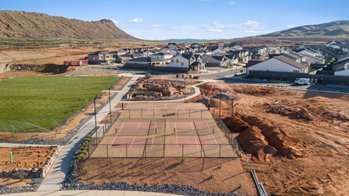 Aerial view of the movie lawn and the many pickleball courts at the Long Valley master planned community.