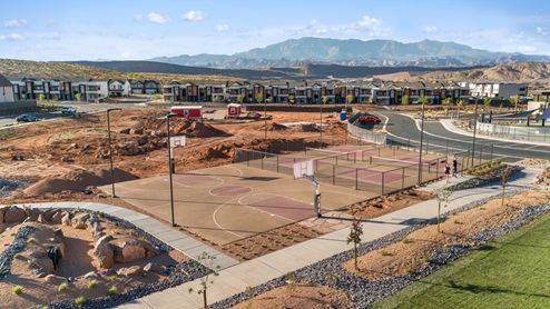 A closer aerial view of the basketball courts at Long Valley a master planned community by D.R. Horton in Washington City Utah.