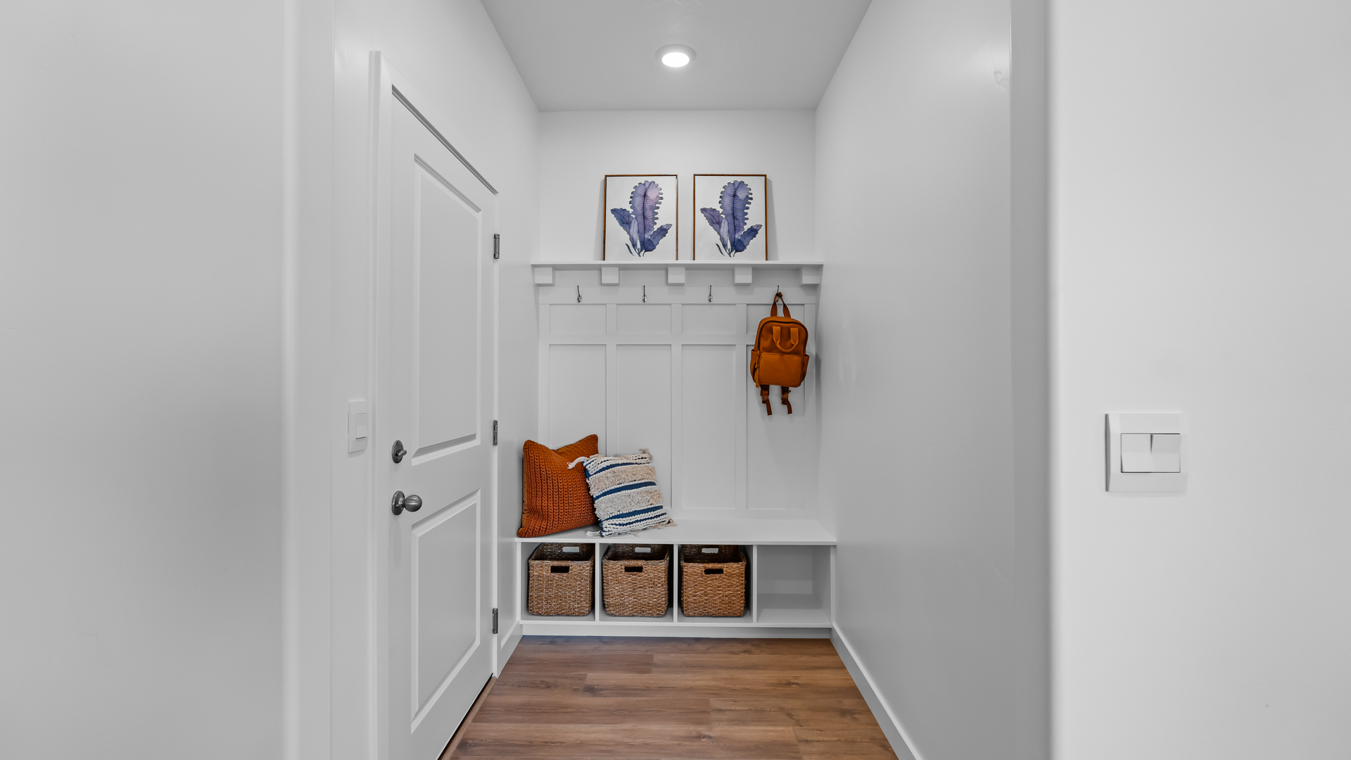 Mud room with built in cubbies and bench