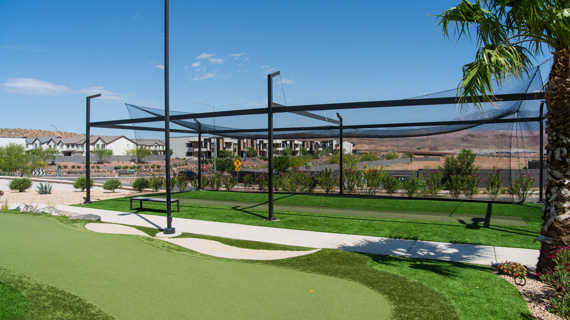 Golf putting range and golf driving net.