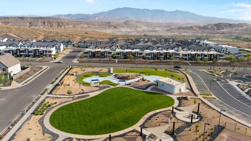 Grass area park near splashpad.